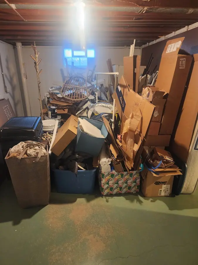 Roll-off dumpster container at job site for 8 Yard Dumpster Rental in Corinth